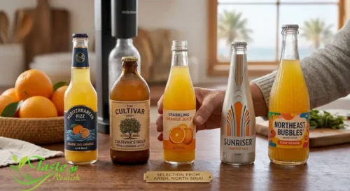 Selection of commercial sparkling orange juice bottles