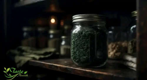 Dried molokhia stored in a sealed glass jar in a dark pantry