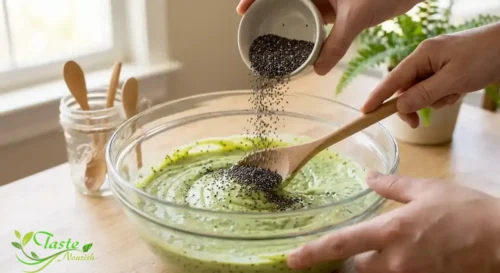 Stirring chia seeds into avocado pudding mixture