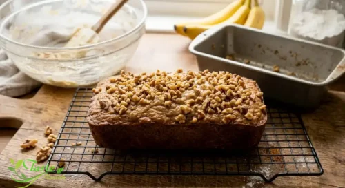 Golden baked banana nut bread cooling