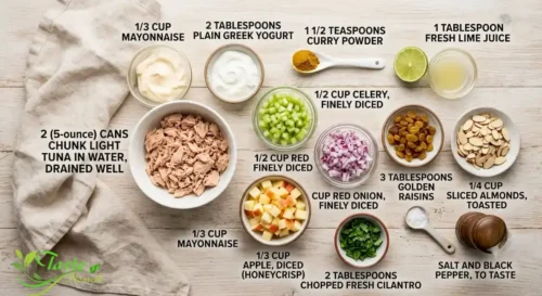  ingredients for curried tuna salad including canned tuna, curry powder, mayonnaise, and celery