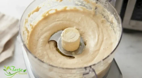 whipped, creamy homemade hummus texture in a food processor