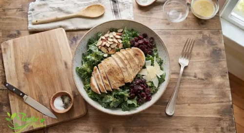 protein kale chicken salad with a fork