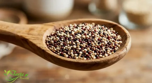 Does Quinoa Go Bad? raw quinoa seeds in a wooden spoon