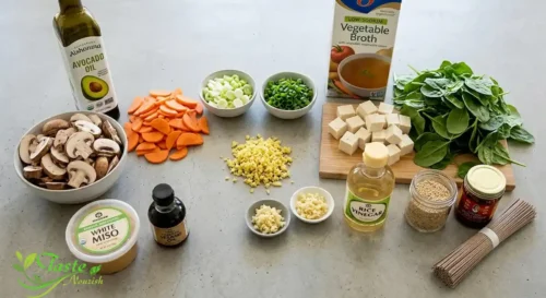 Ingredients for ginger miso soup including fresh ginger, mushrooms, tofu, spinach, and miso paste